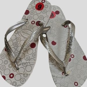 Havaianas, silver with red and silver dots on light gray footbed. Sz 6